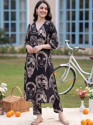 women printed regular cotton kurta with trousers 6