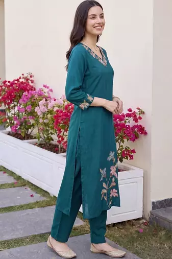 women floral embroidered regular thread work kurta with trousers