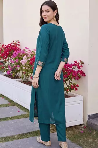 women floral embroidered regular thread work kurta with trousers