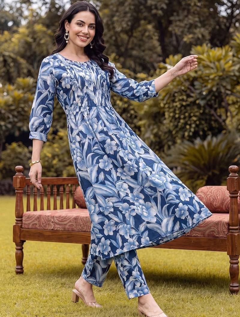 women floral printed regular cotton kurta with trousers