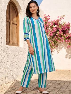 women printed regular cotton kurta with trousers 6