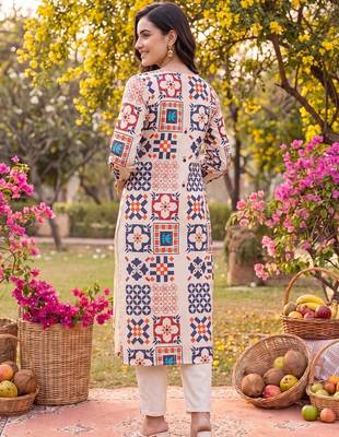 women printed regular kurta with trousers 4