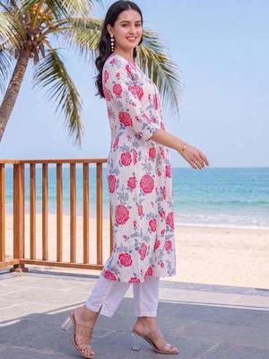 women floral printed regular cotton kurta with trousers 6