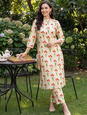 women floral printed regular cotton kurta with trousers 1