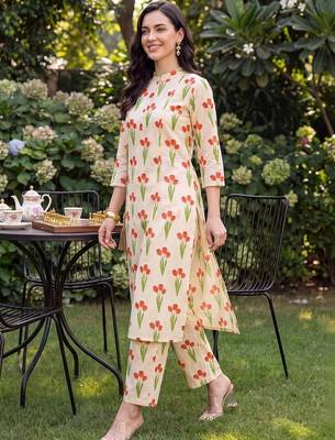 women floral printed regular cotton kurta with trousers 3