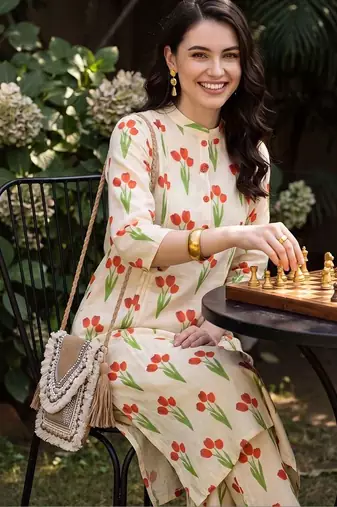 women floral printed regular cotton kurta with trousers