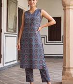 women printed regular cotton kurta with trousers