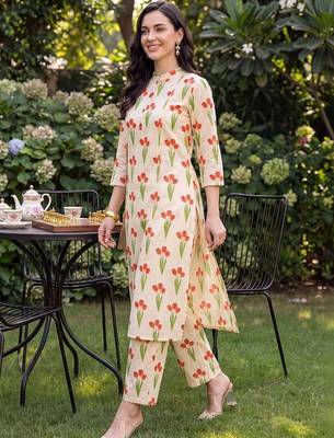 women floral printed regular cotton kurta with trousers 4