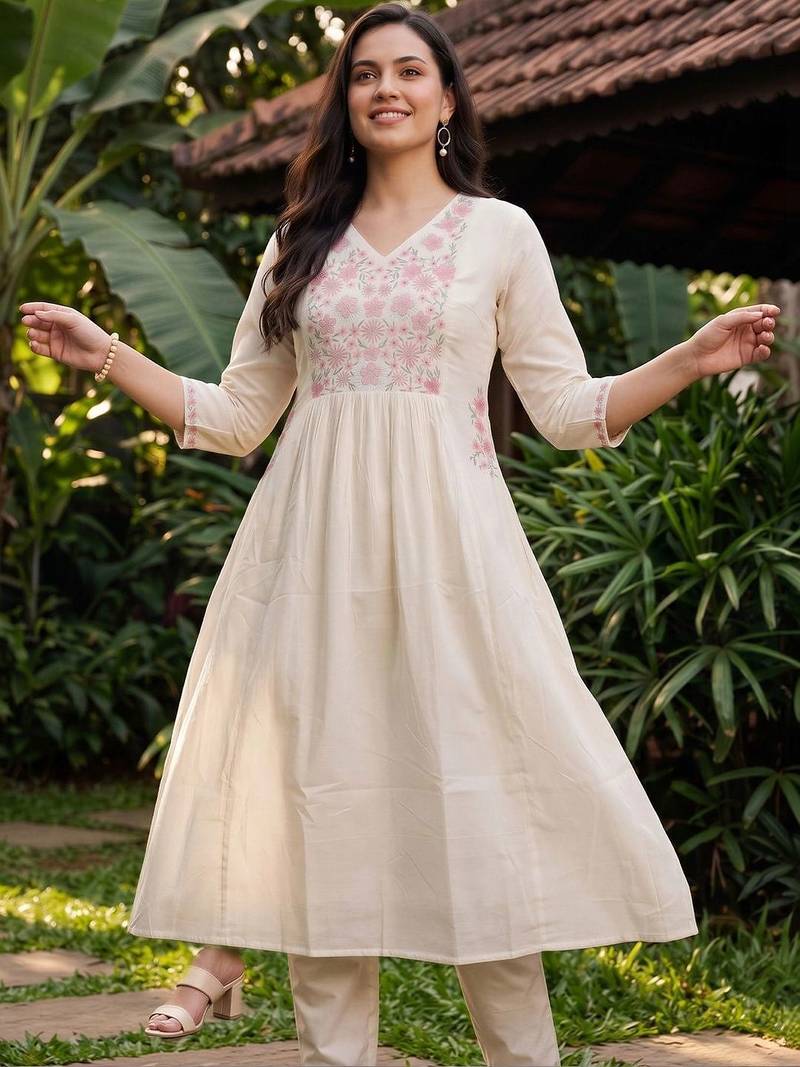 women floral embroidered empire thread work cotton kurta with trousers