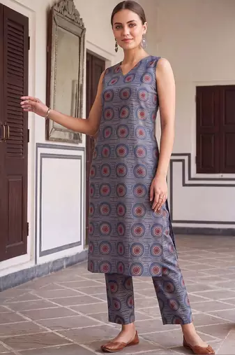 women printed regular cotton kurta with trousers