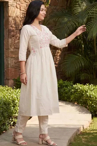women floral embroidered regular thread work cotton kurta with trousers