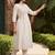 women floral embroidered regular thread work cotton kurta with trousers