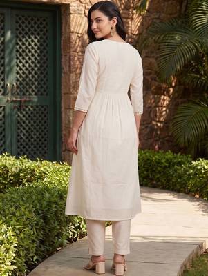 women floral embroidered regular thread work cotton kurta with trousers 4