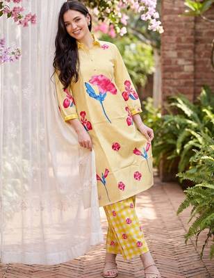 women printed regular cotton kurta with trousers 6