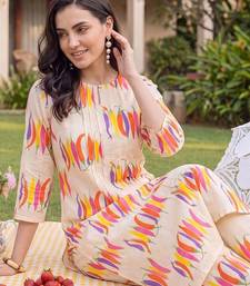 women printed regular cotton kurta with trousers