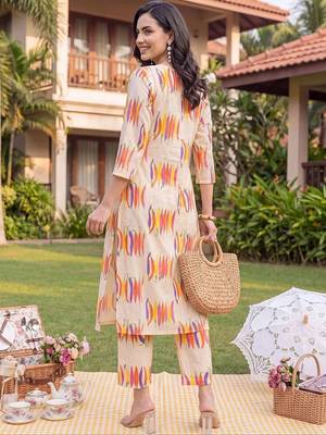 women printed regular cotton kurta with trousers 4