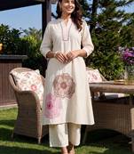 women floral embroidered regular thread work kurta with trousers