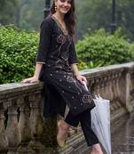 women floral embroidered regular thread work kurta with trousers