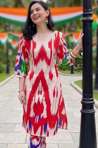 women printed regular cotton kurta with trousers