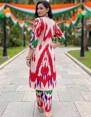 women printed regular cotton kurta with trousers 4