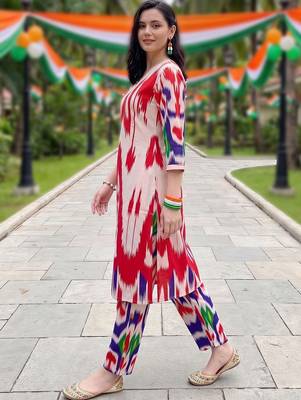 women printed regular cotton kurta with trousers 6