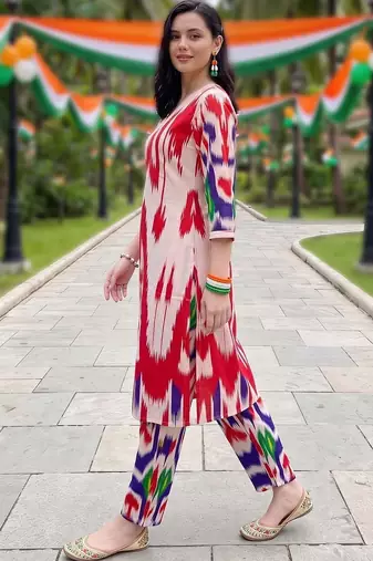 women printed regular cotton kurta with trousers