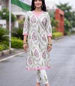women floral printed regular cotton kurta with trousers