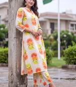 women printed regular cotton kurta with trousers