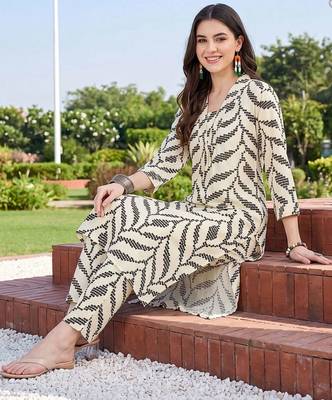 women printed regular kurta with trousers 1