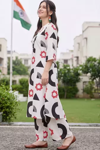 women printed regular cotton kurta with palazzos