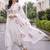 women floral printed empire cotton kurta with trousers & with dupatta