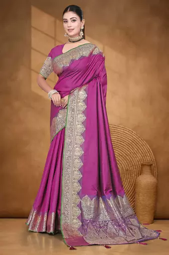 Banarasi magenta silk blend saree with golden zari work, border and tassels with blouse