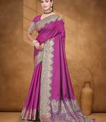 Banarasi magenta silk blend saree with golden zari work, border and tassels with blouse
