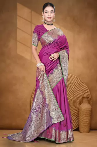 Banarasi magenta silk blend saree with golden zari work, border and tassels with blouse