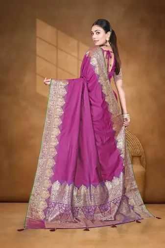 Banarasi magenta silk blend saree with golden zari work, border and tassels with blouse