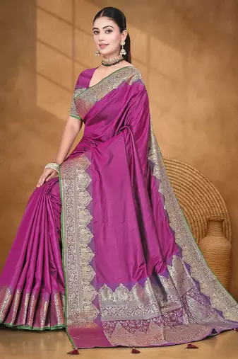 Banarasi magenta silk blend saree with golden zari work, border and tassels with blouse