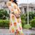 women printed regular cotton kurta with trousers