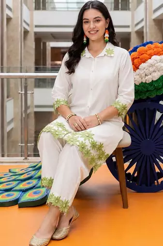 women floral embroidered regular thread work cotton kurta with trousers