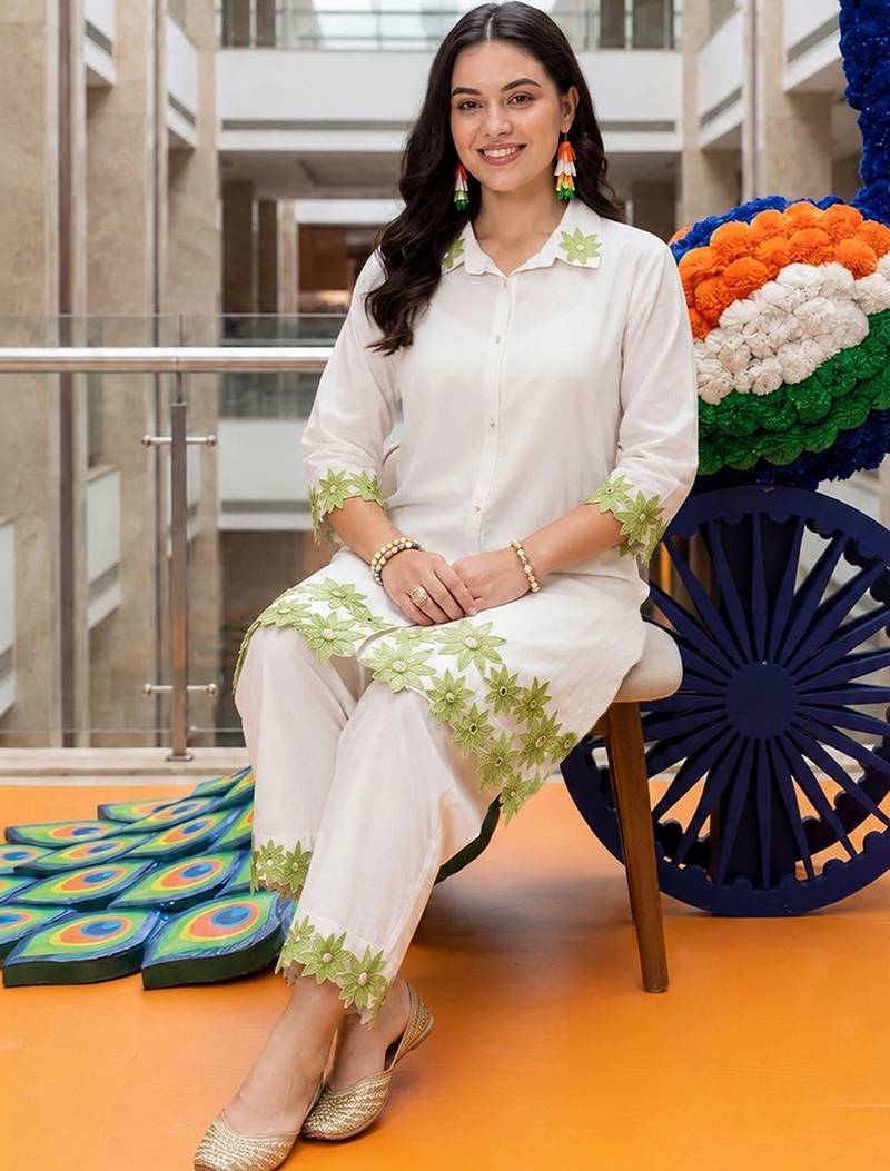 women floral embroidered regular thread work cotton kurta with trousers