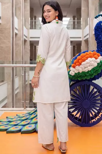 women floral embroidered regular thread work cotton kurta with trousers