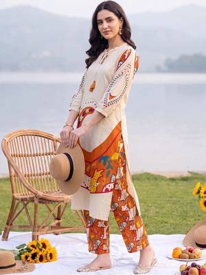 women printed regular cotton kurta with trousers 3