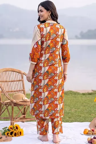 women printed regular cotton kurta with trousers