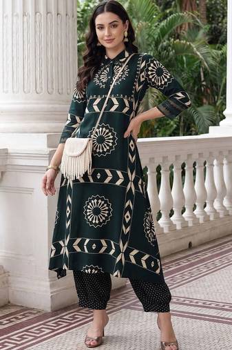 women ethnic motifs printed regular kurta with trousers