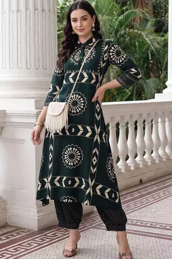 women ethnic motifs printed regular kurta with trousers