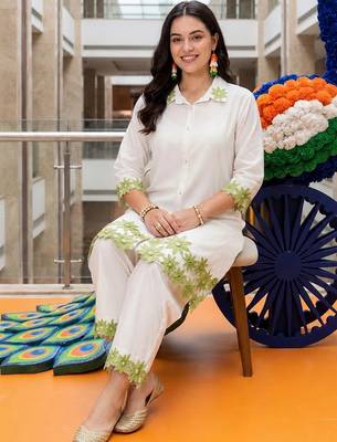 women floral embroidered regular thread work cotton kurta with trousers 5