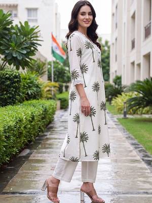 women floral printed regular cotton kurta with trousers 3