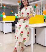 women floral printed regular cotton kurta with trousers