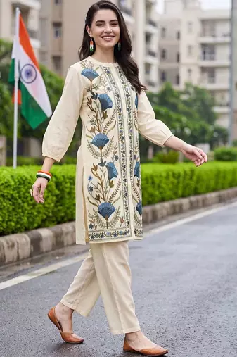 women floral embroidered regular thread work cotton kurta with trousers