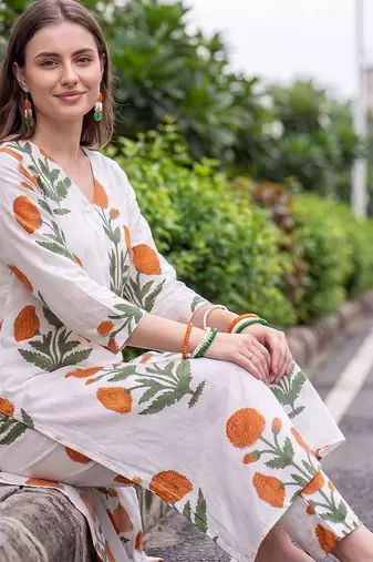 women floral printed regular cotton kurta with trousers