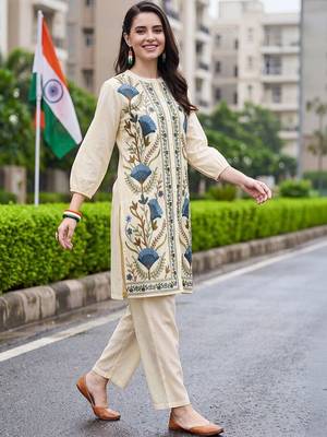 women floral embroidered regular thread work cotton kurta with trousers 1